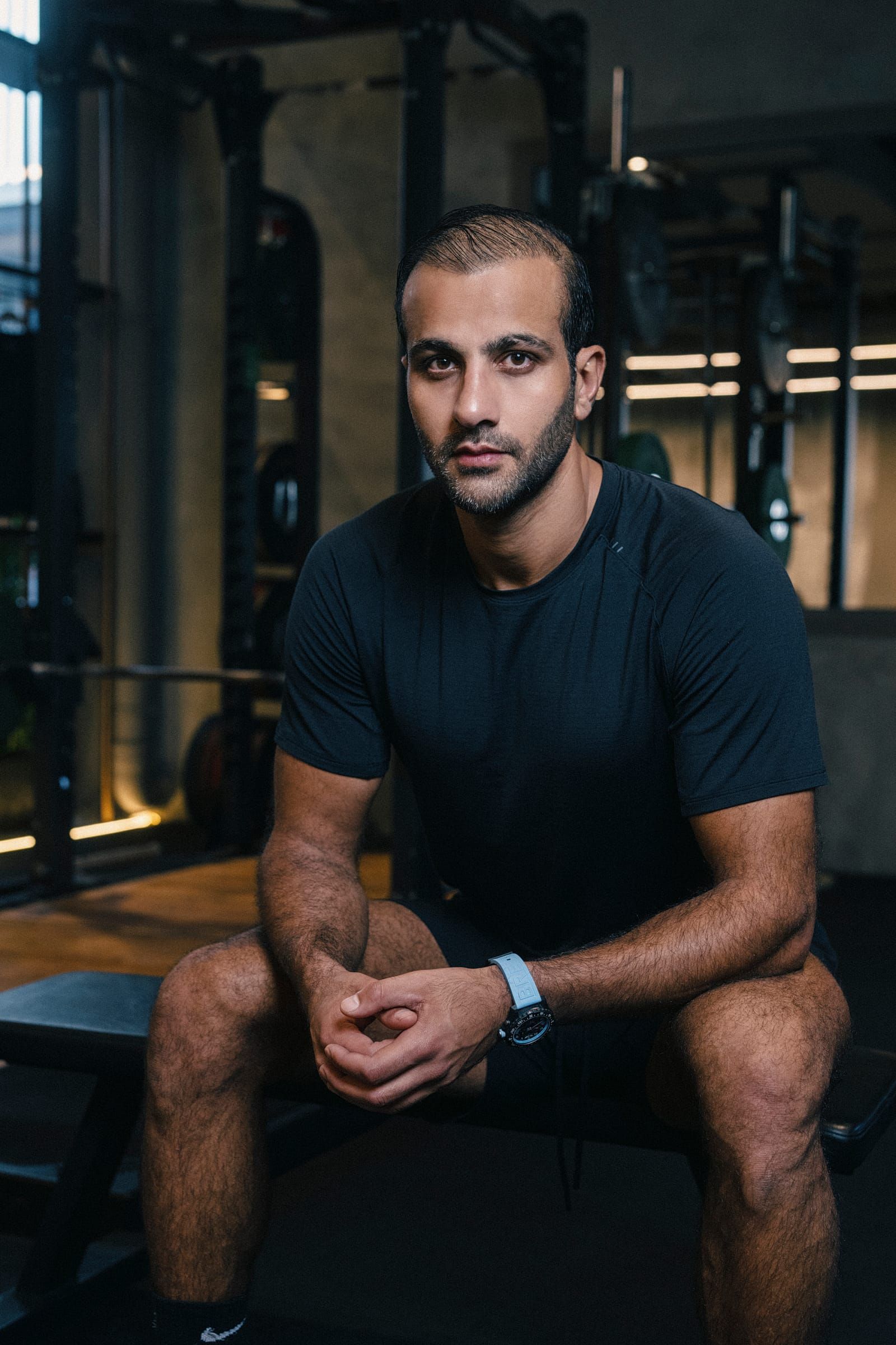 Portrait of Mohamed Sultan sitting in the gym